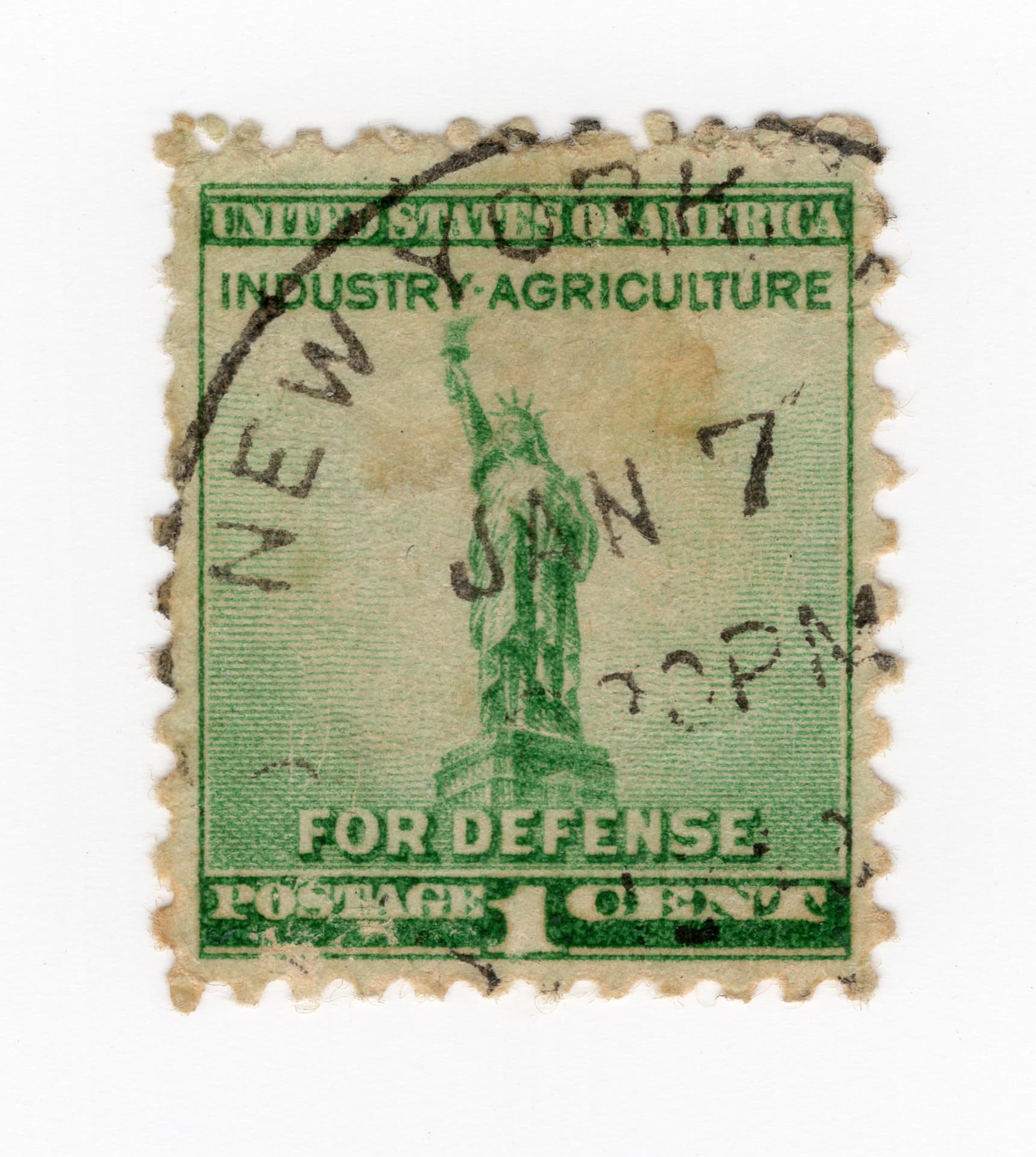 Postmarked green United States one-cent postage stamp depicting the Statue of Liberty, inscribed Industry • Agriculture and For Defense