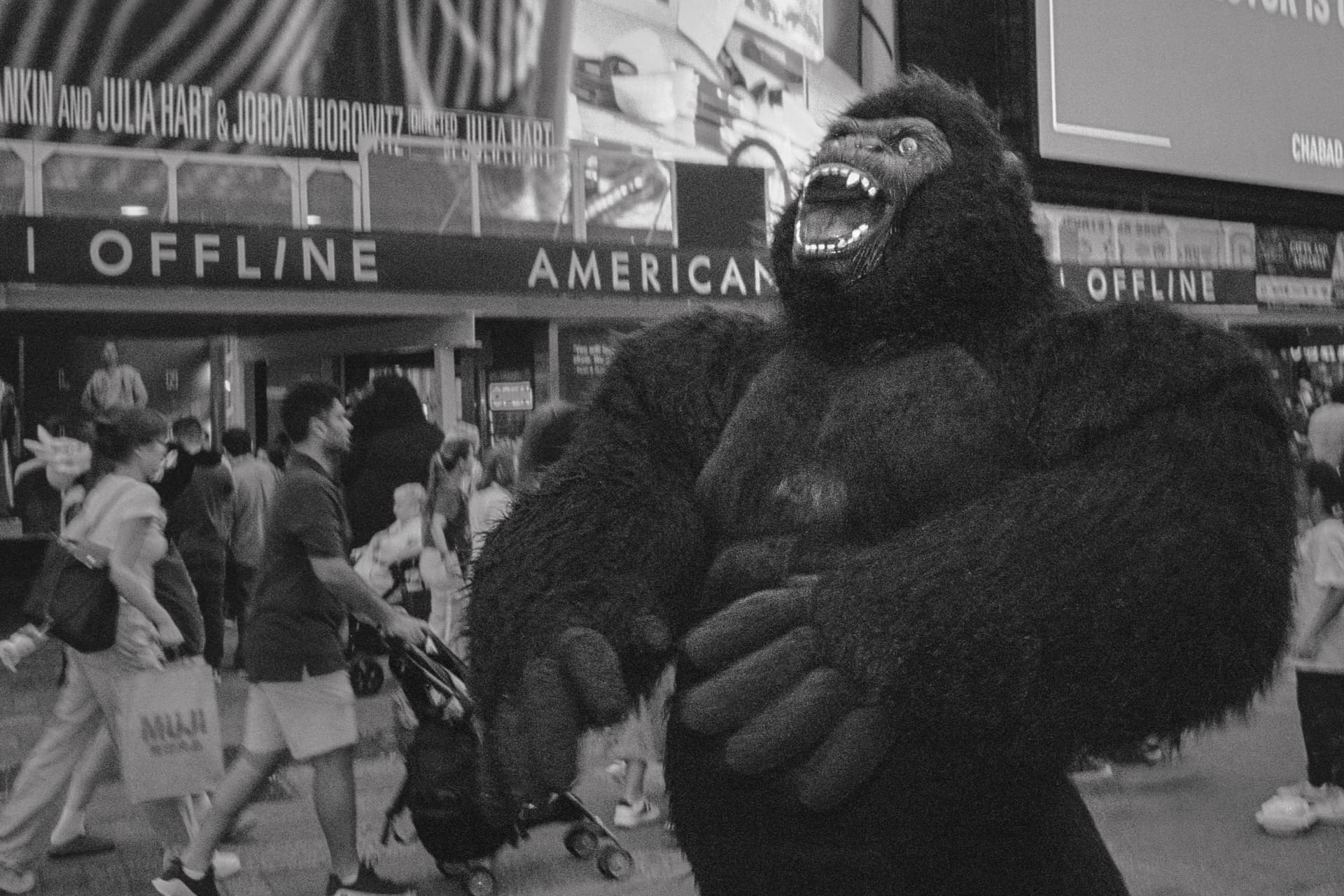 Costumed gorilla roaring in Times Square