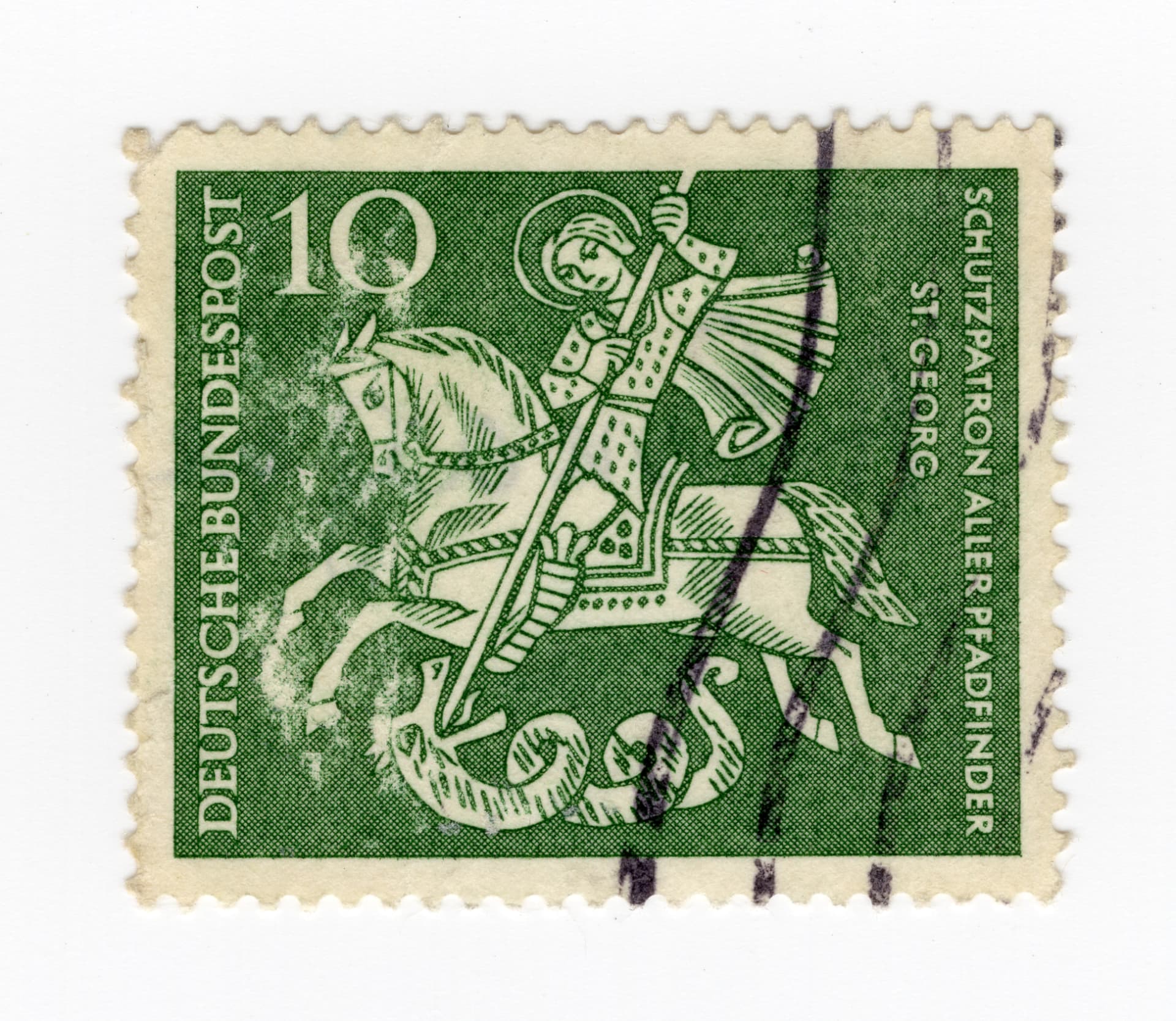 Green German stamp, 10 Pfennig: Saint George, patron saint of all scouts, on horseback spearing a dragon